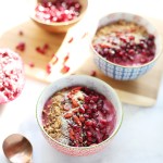 Cherry Pomegranate Smoothie Bowl // Celebrate seasonal pomegranates with this bright and bursting cherry pomegranate smoothie bowl topped with superfoods like chia and goji berries. Plus enjoy 5 other incredible smoothie bowl recipes from my favorite blogging bunch.